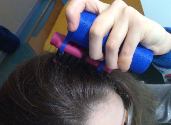 Poignée brosse à cheveux